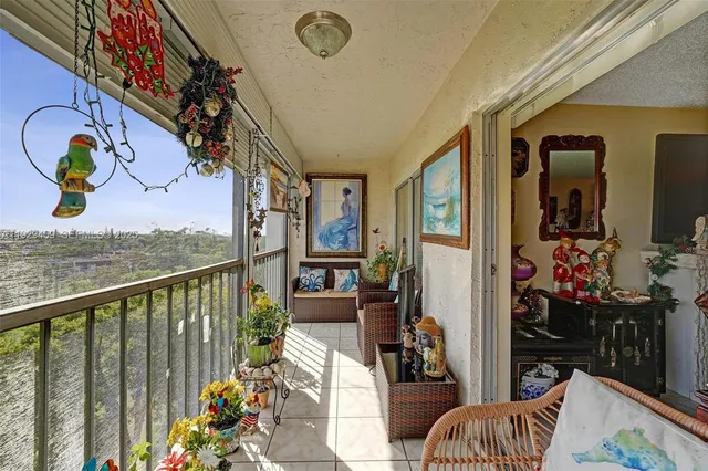 a view of swimming pool from a lounge chair