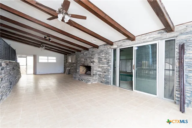 a view of a livingroom with a fireplace