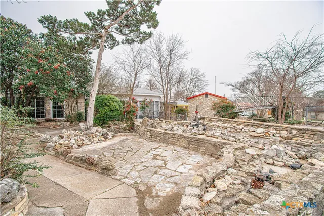 a view of a yard with a snow