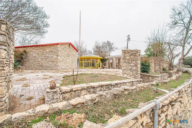 a house view with a outdoor space