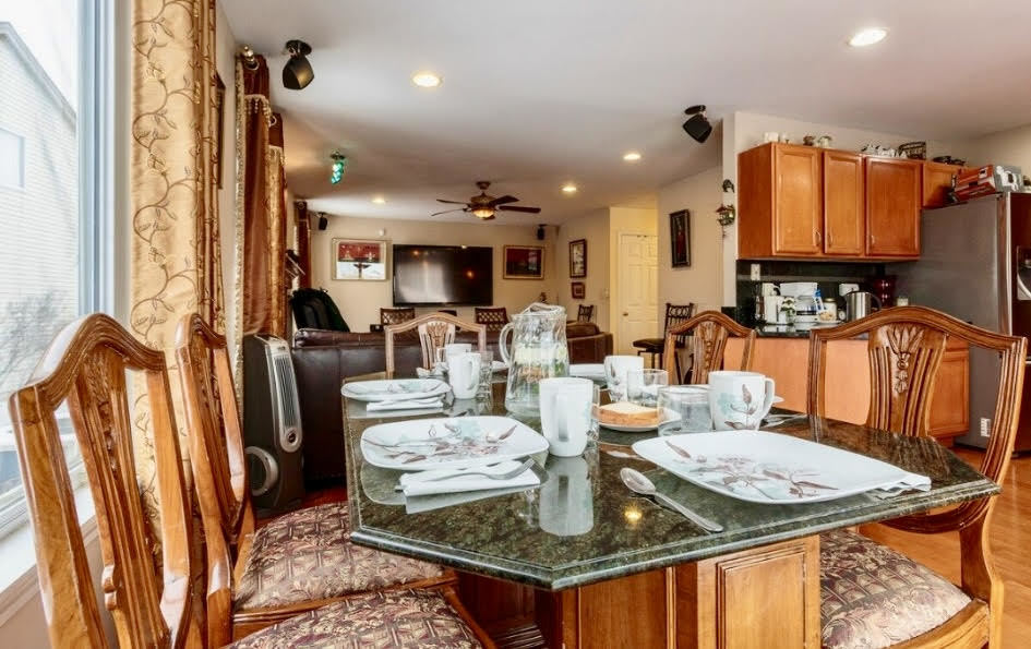 671 Wintergreen Circle Naperville, IL 60540 - Photo 7 of 17 a living room with fireplace furniture and a flat screen tv