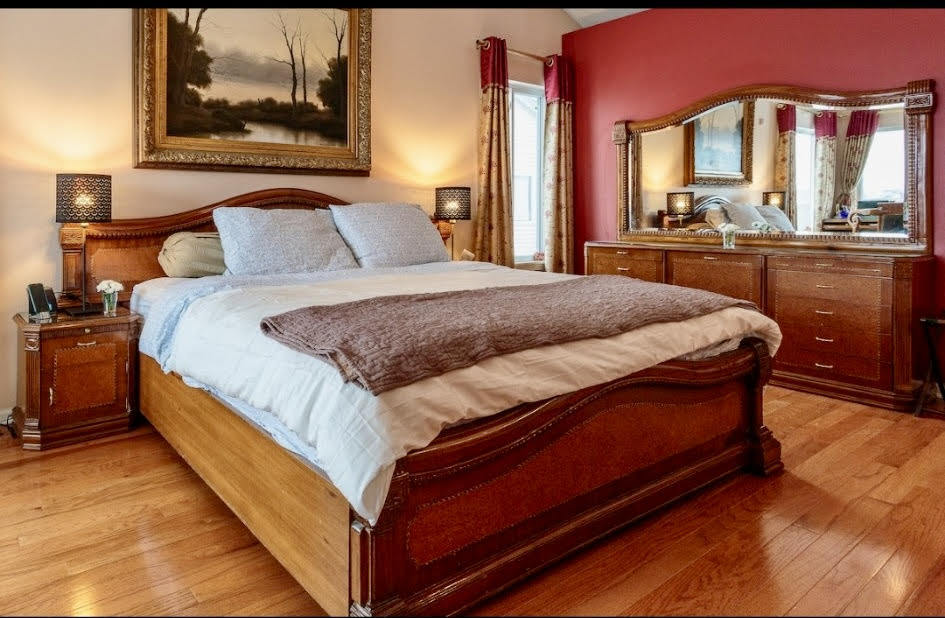 671 Wintergreen Circle Naperville, IL 60540 - Photo 9 of 17 a bedroom with a bed and window