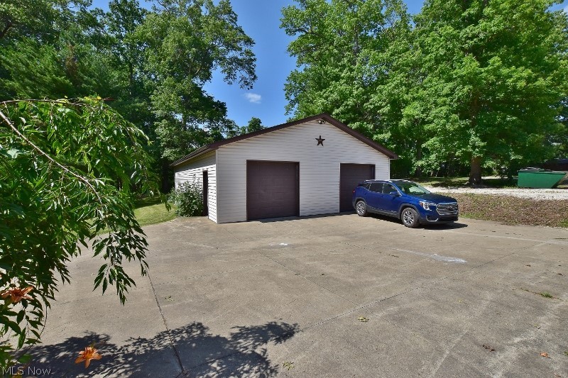 5007 Raven Road Southeast Carrollton, OH 44615 - Photo 46 of 50 This 32x48 finished heated garage is conveniently located closest to the house.