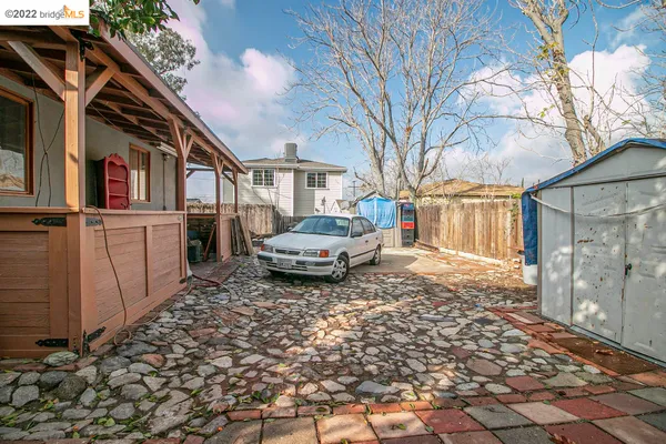 a house view with a backyard