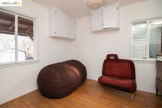 a room with furniture and window