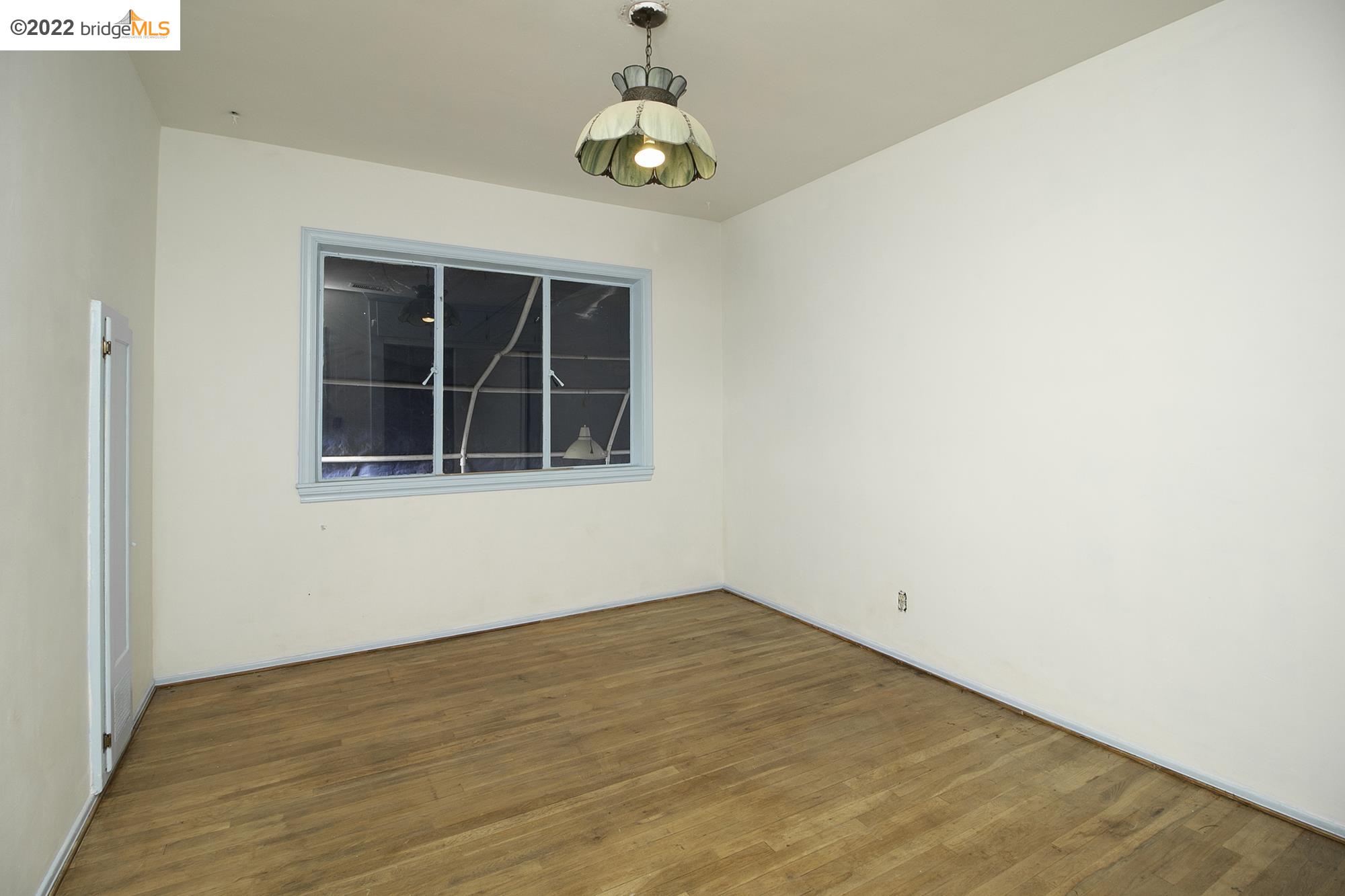 7755 Forsythe Street Tujunga, CA 91042 - Photo 8 of 15 an empty room with windows