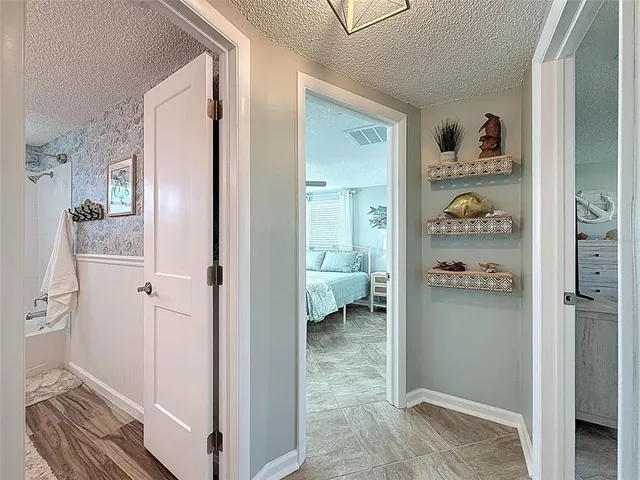 a bathroom with a toilet a sink and a mirror