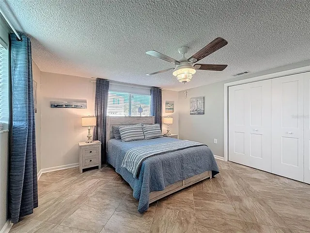 a view of swimming pool with seating area