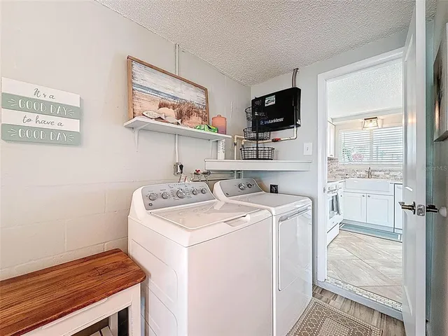 a view of a lake with a house in the background