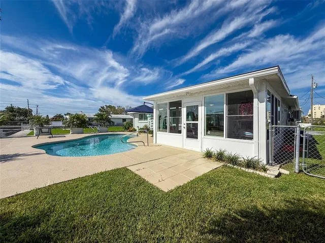 a view of a lake with a yard