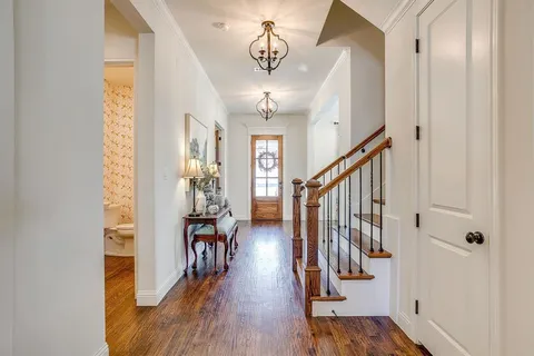 a view of entryway with wooden floor