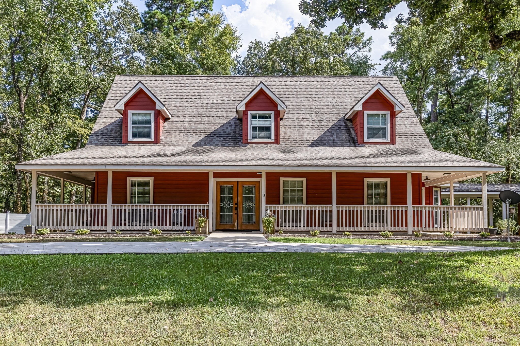 a house view with a garden space