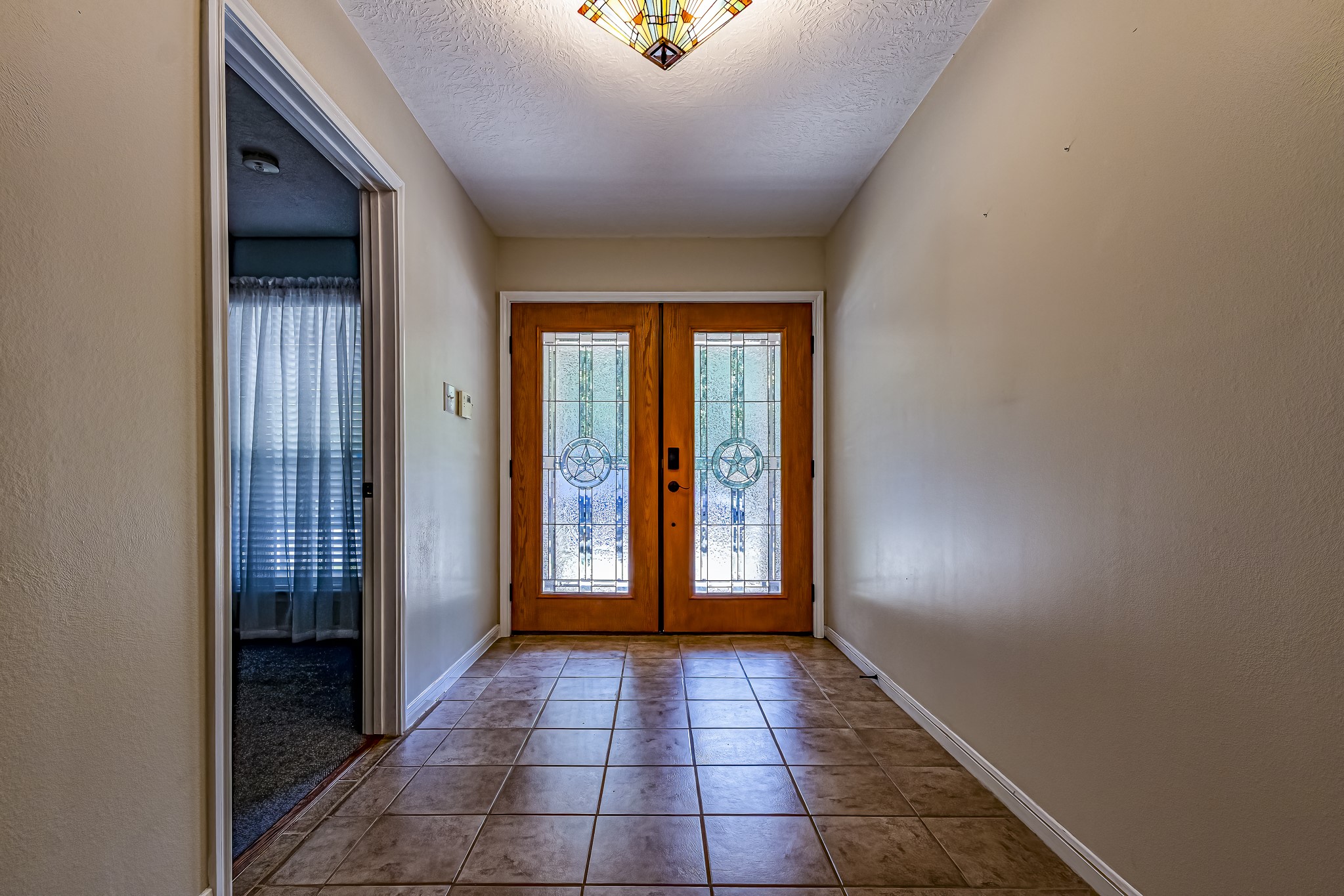 12 Quiet Wind Trinity, TX 75862 - Photo 12 of 47 wooden floor in an empty room with a window