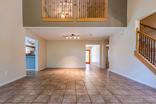 a view of an empty room and window
