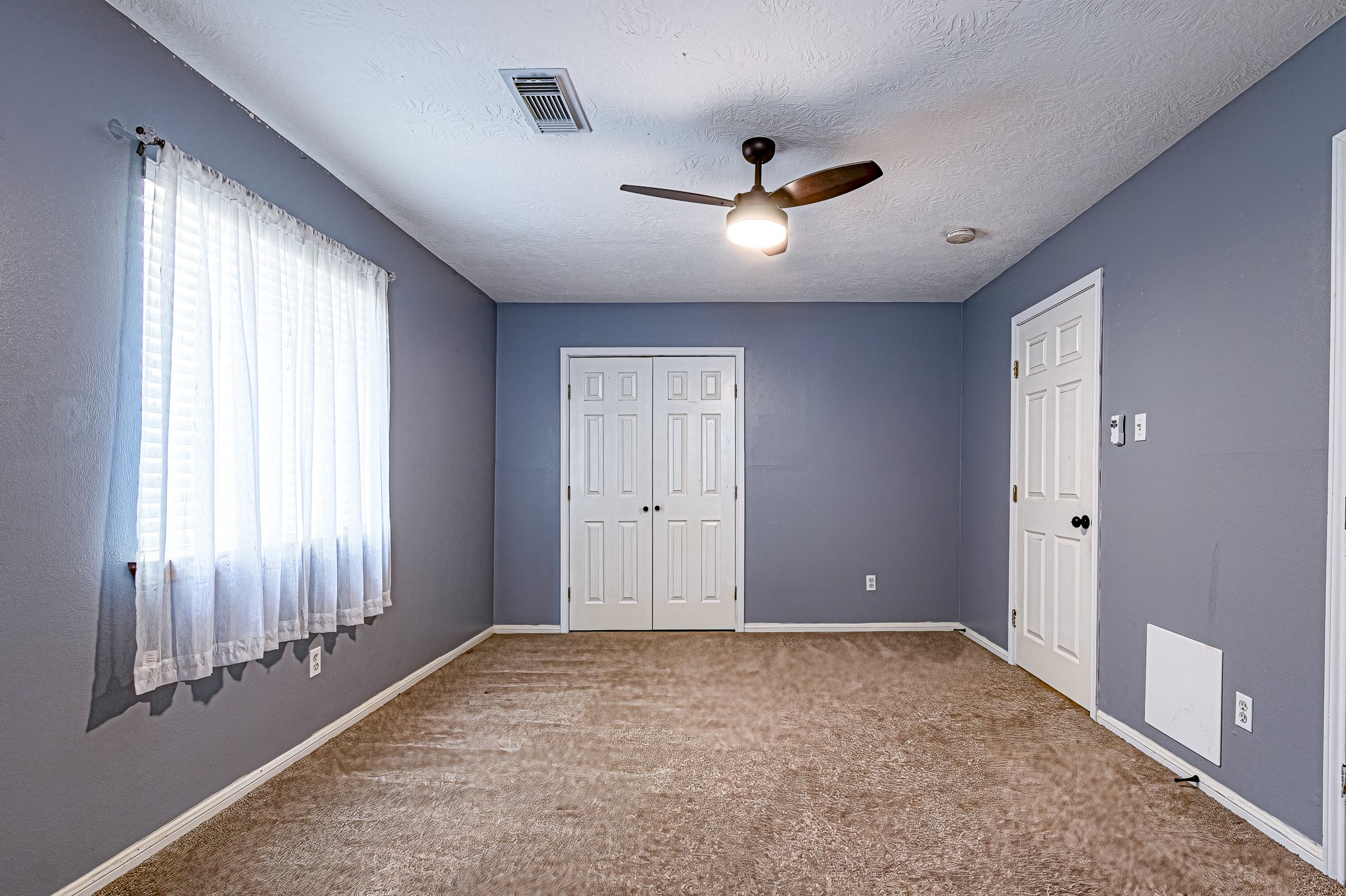 12 Quiet Wind Trinity, TX 75862 - Photo 19 of 47 a view of an empty room with a window