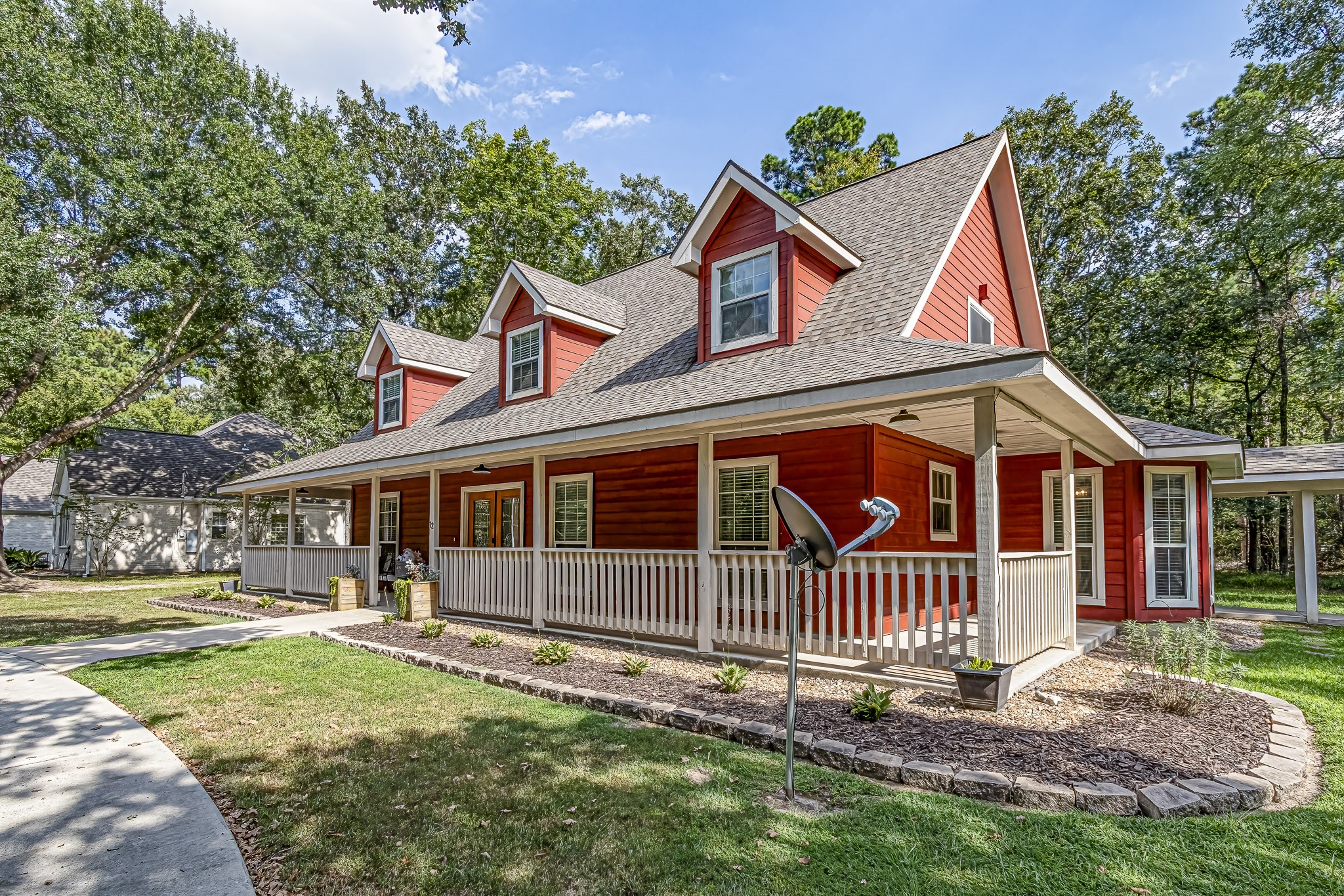 12 Quiet Wind Trinity, TX 75862 - Photo 2 of 47 a view of a house with a yard and a garden