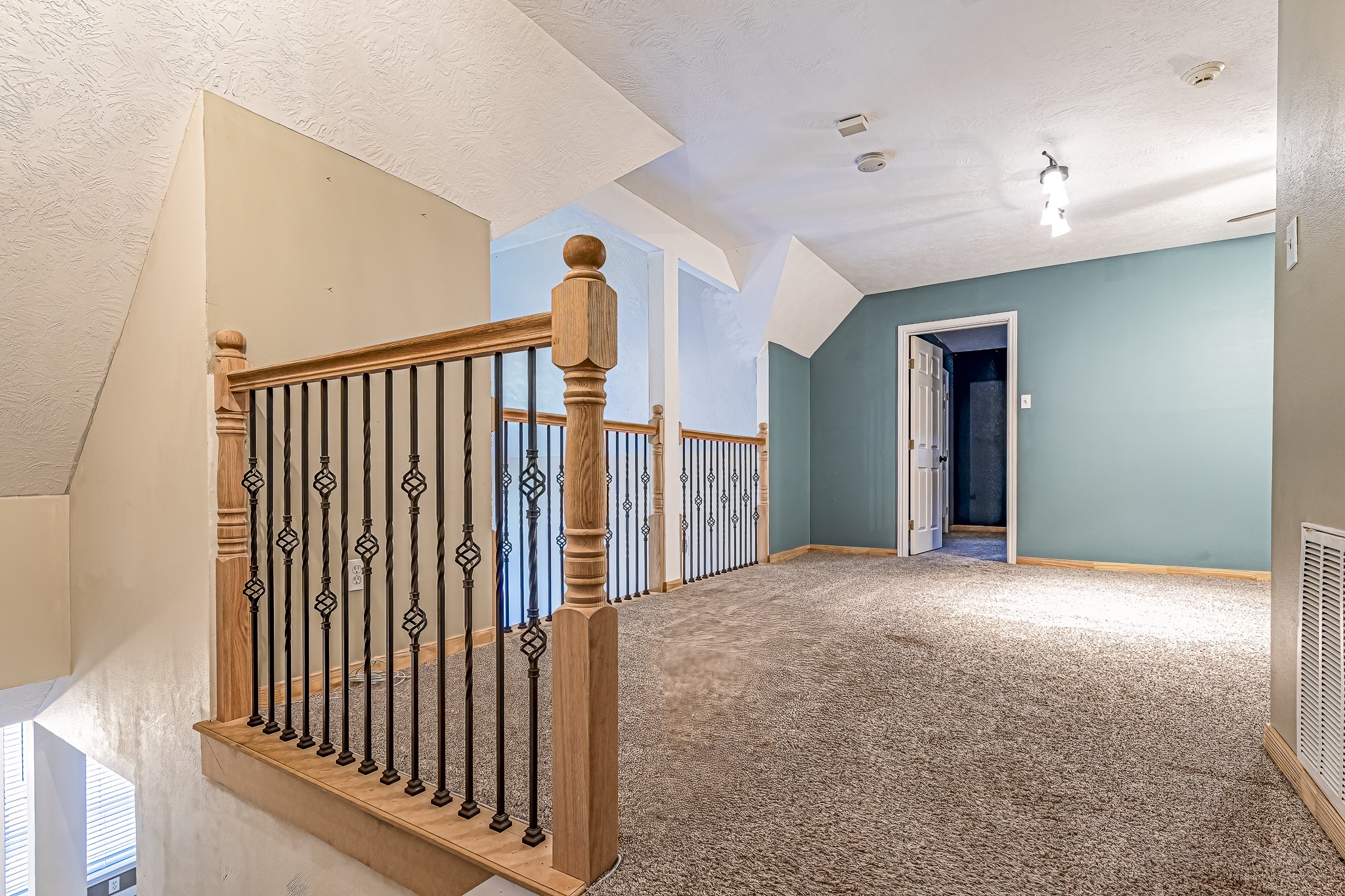 12 Quiet Wind Trinity, TX 75862 - Photo 21 of 47 View of the game room coming up the stairs.