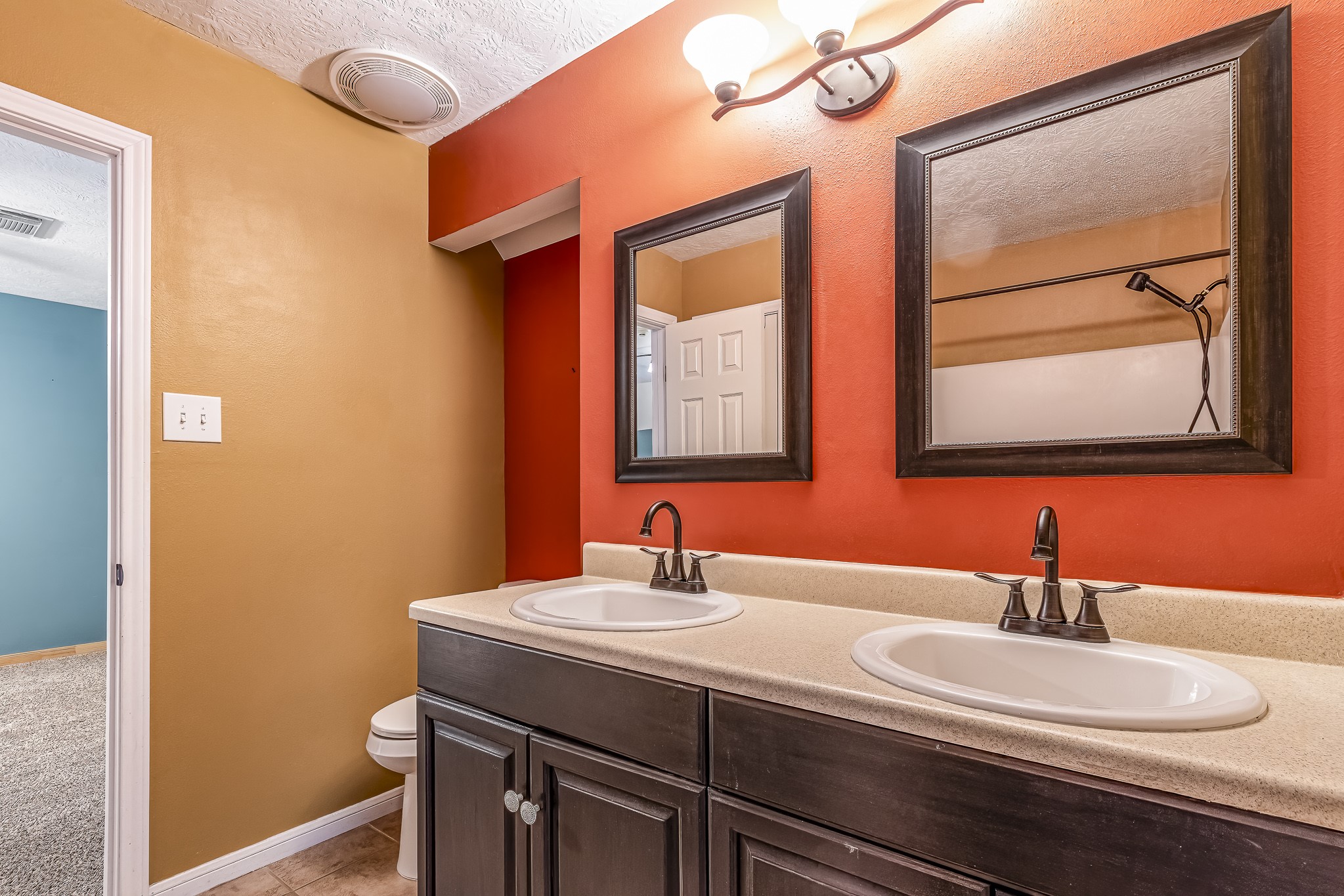 12 Quiet Wind Trinity, TX 75862 - Photo 40 of 47 a bathroom with a sink and a mirror