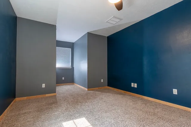 an aerial view of a house with outdoor space pool seating area and yard