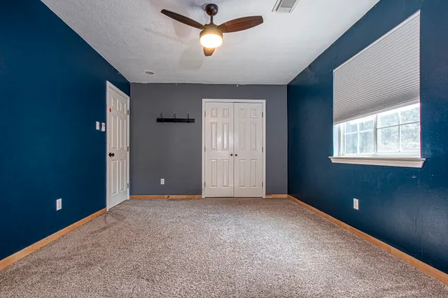 a view of street with trees in the background