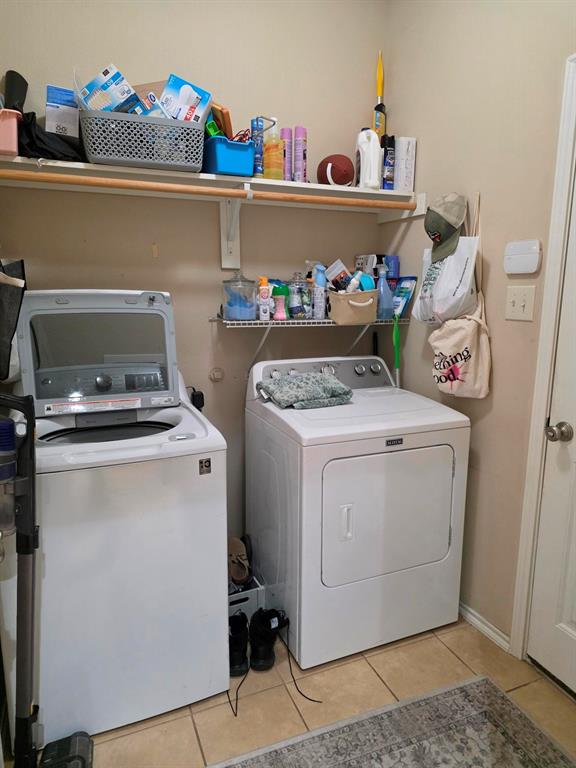 213 Independence Trail Forney, TX 75126 - Photo 13 of 17 a utility room with dryer and washer