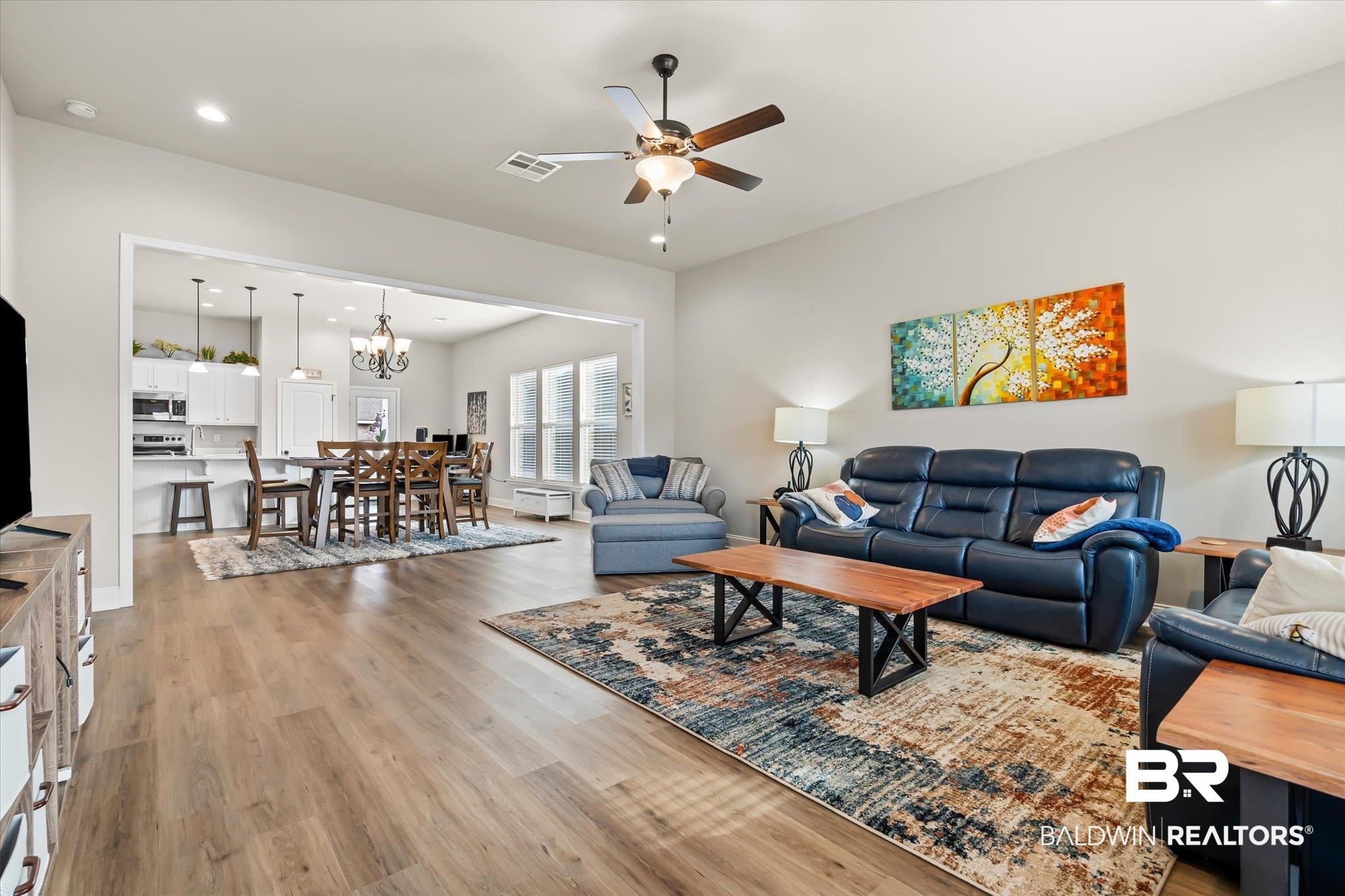 1116 Stella Road Foley, AL 36535 - Photo 3 of 29 Living room with ceiling fan with notable chandelier and light hardwood / wood-style flooring