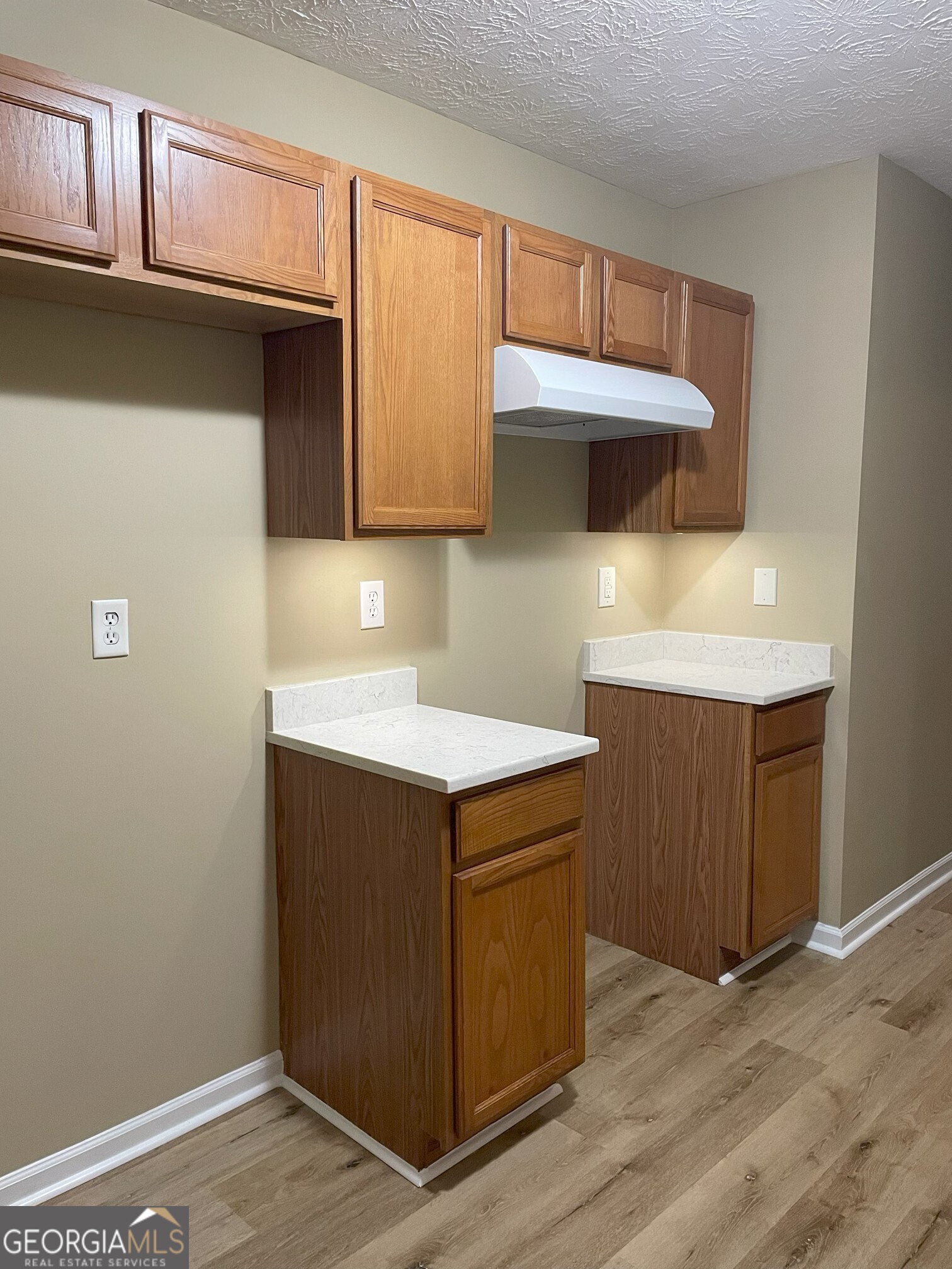 134 Cemetary Road Luthersville, GA 30251 - Photo 10 of 18 a kitchen with a sink and cabinets