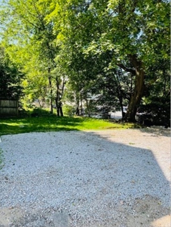 12 Cottage Street Stoneham, MA 02180 - Photo 13 of 16 a view of a swimming pool with a yard