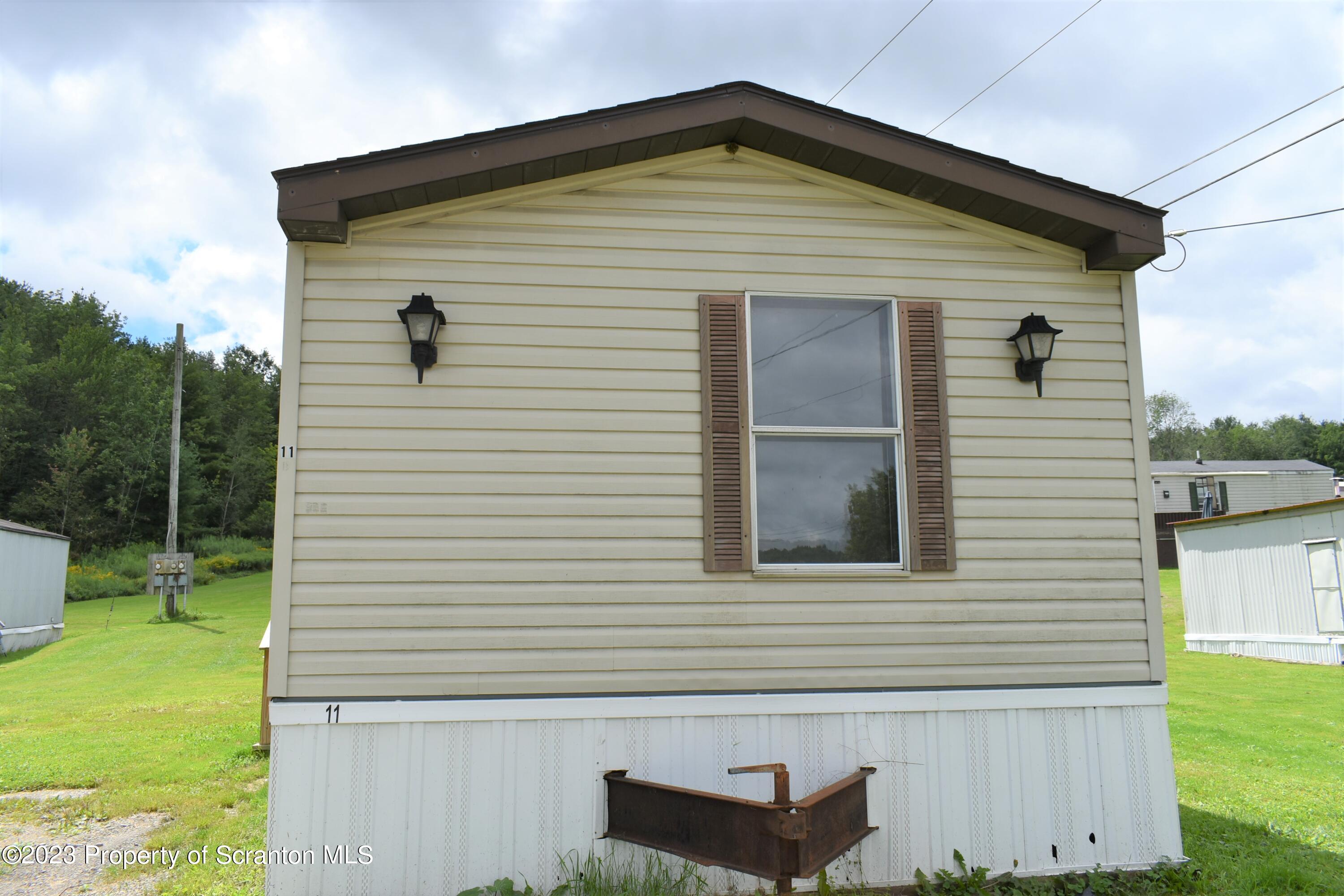 940 Nowlan Road, Unit 11 Port Crane, NY 13833 - Photo 2 of 14 Roadside (2)