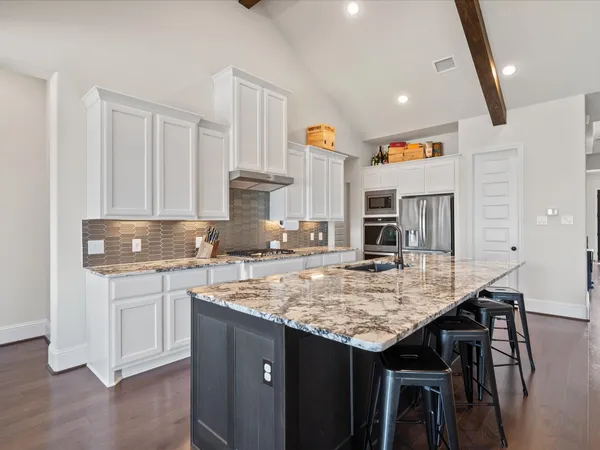 $515,000 | 605 Ashbrook Ridge Lane, Pinehurst, TX 77362