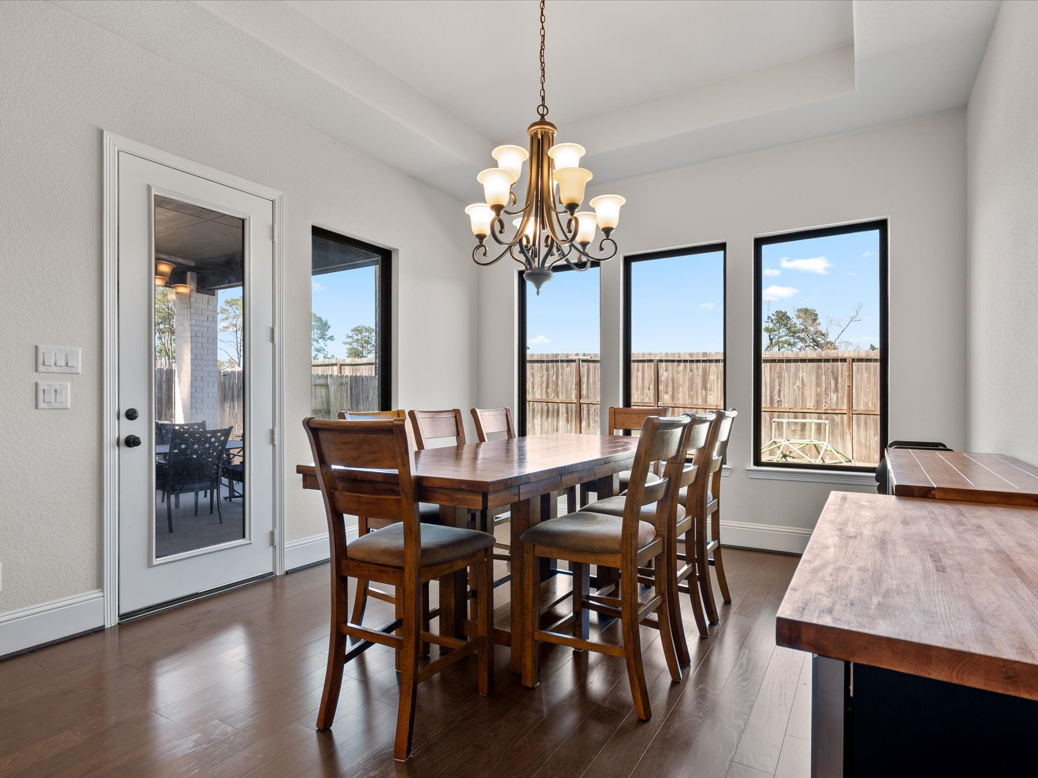 605 Ashbrook Ridge Lane Pinehurst, TX 77362 - Photo 19 of 46 The dining space overlooks the backyard, offering peaceful views while you gather around the table.