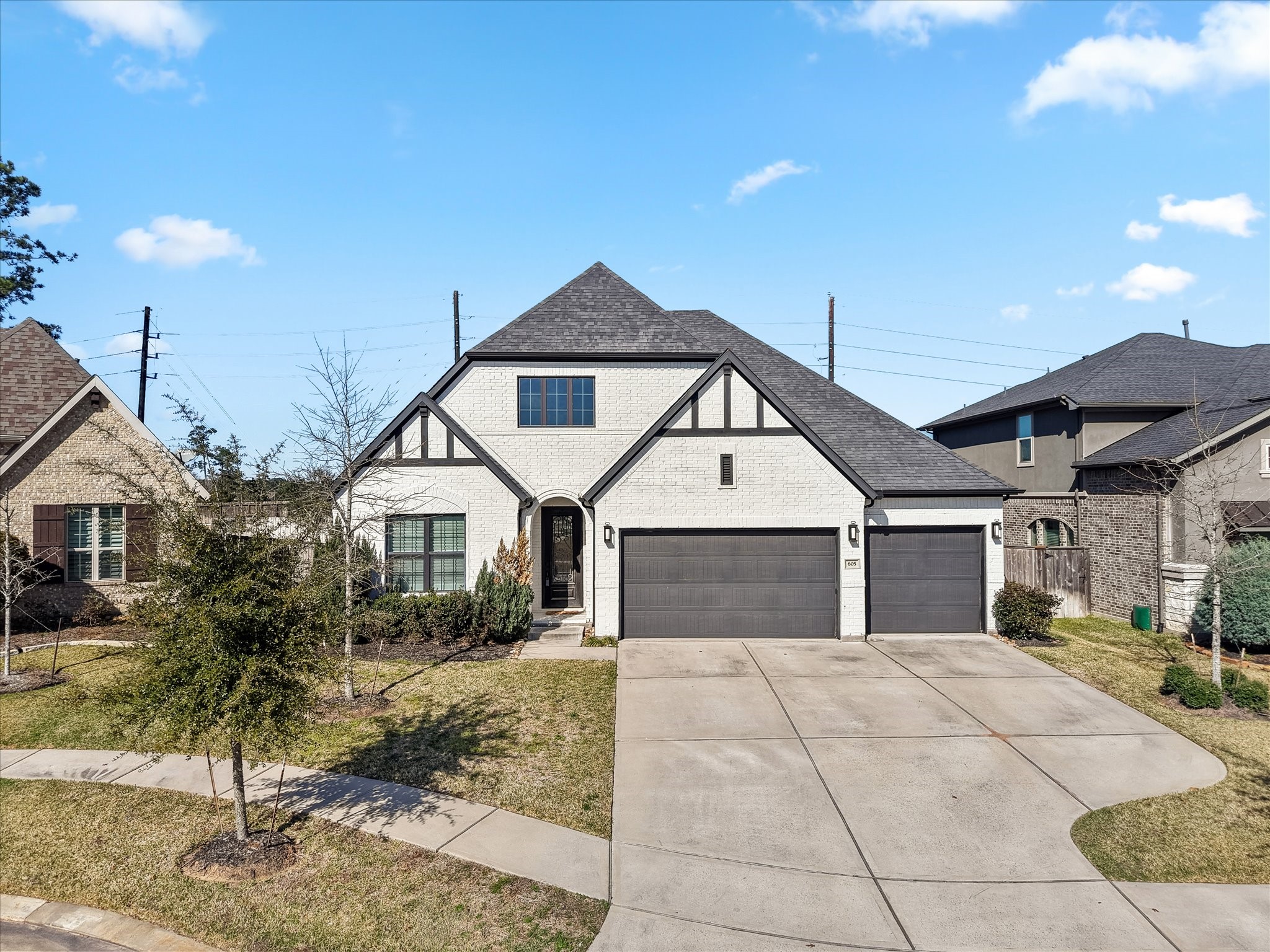 605 Ashbrook Ridge Lane Pinehurst, TX 77362 - Photo 2 of 46 Boasting 3 bedrooms, 3 baths, and a 3-car garage, this spacious single-story layout offers 2,786 square feet of beautifully designed living with comfort and functionality in mind.