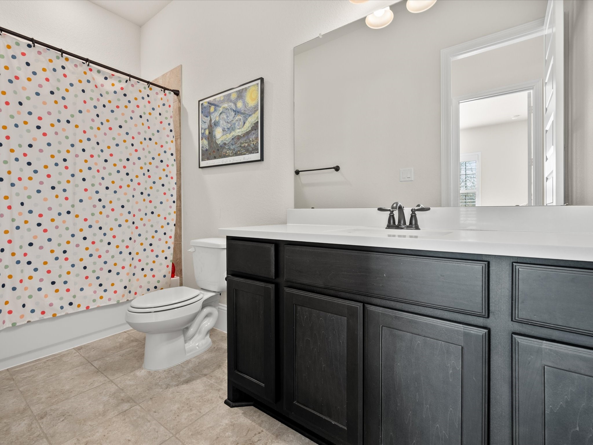 605 Ashbrook Ridge Lane Pinehurst, TX 77362 - Photo 30 of 46 The second full bath features a convenient tub/shower combination.