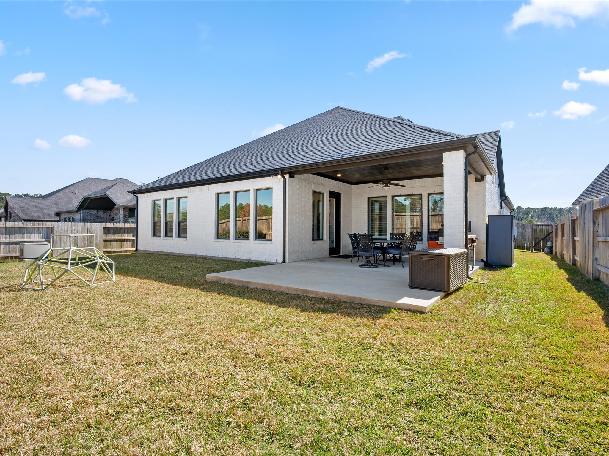 605 Ashbrook Ridge Lane Pinehurst, TX 77362 - Photo 35 of 46 The generous yard offers plenty of room to entertain, play, or simply enjoy the outdoors.