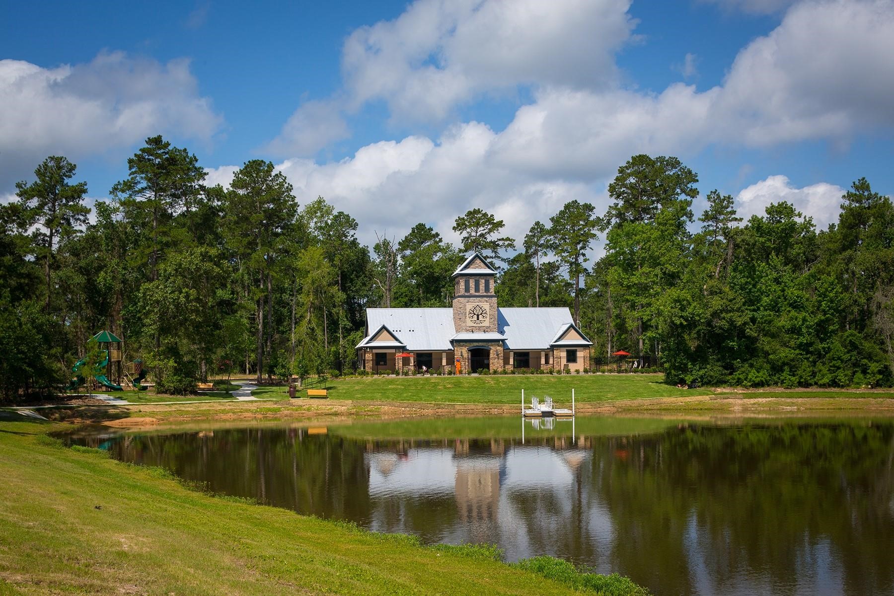 605 Ashbrook Ridge Lane Pinehurst, TX 77362 - Photo 45 of 46 Spend afternoons by the scenic lake or exploring the expansive central park — just a few of the reasons Woodtrace feels like more than a neighborhood… it feels like home.