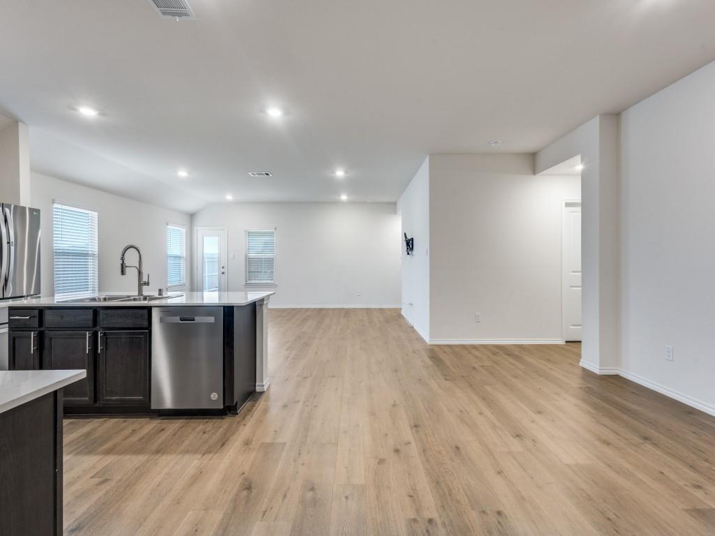 829 Primrose Lane Pilot Point, TX 76258 - Photo 12 of 37 a view of kitchen with wooden floor
