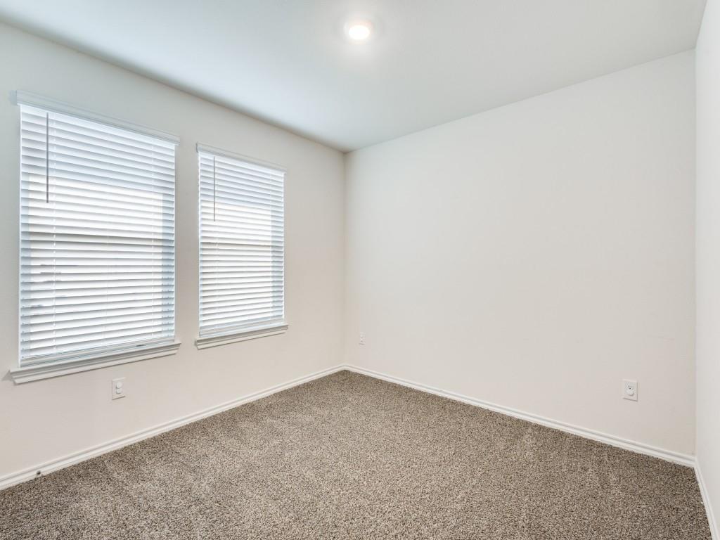 829 Primrose Lane Pilot Point, TX 76258 - Photo 23 of 37 an empty room with a window