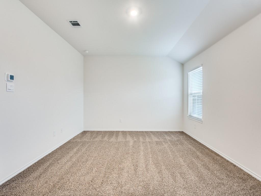 829 Primrose Lane Pilot Point, TX 76258 - Photo 24 of 37 an empty room with a window