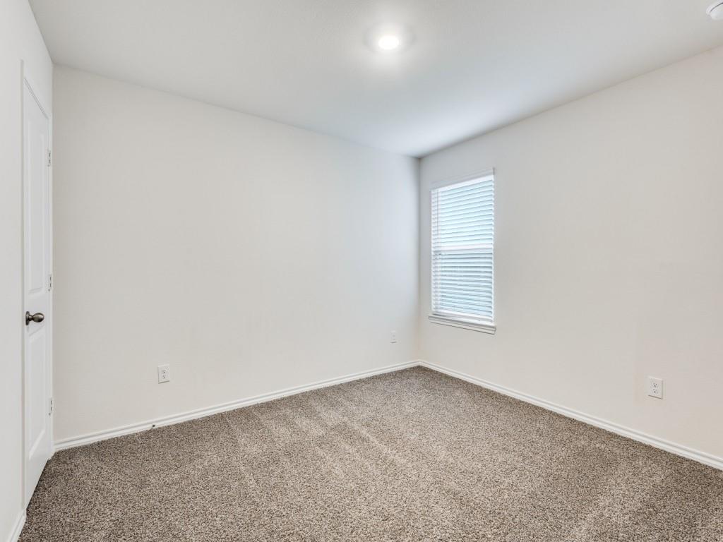 829 Primrose Lane Pilot Point, TX 76258 - Photo 29 of 37 an empty room with a window