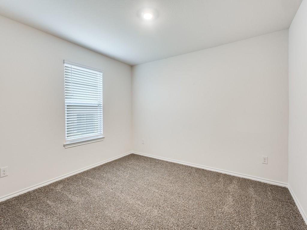 829 Primrose Lane Pilot Point, TX 76258 - Photo 30 of 37 an empty room with a window