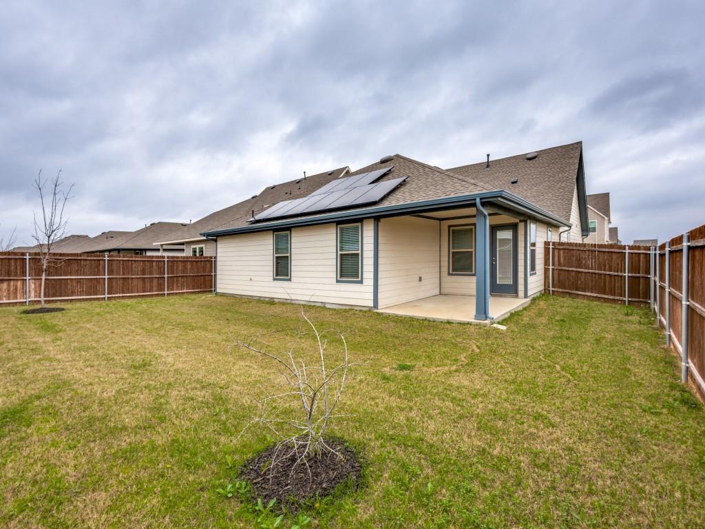 829 Primrose Lane Pilot Point, TX 76258 - Photo 35 of 37 a view of a house with backyard and deck