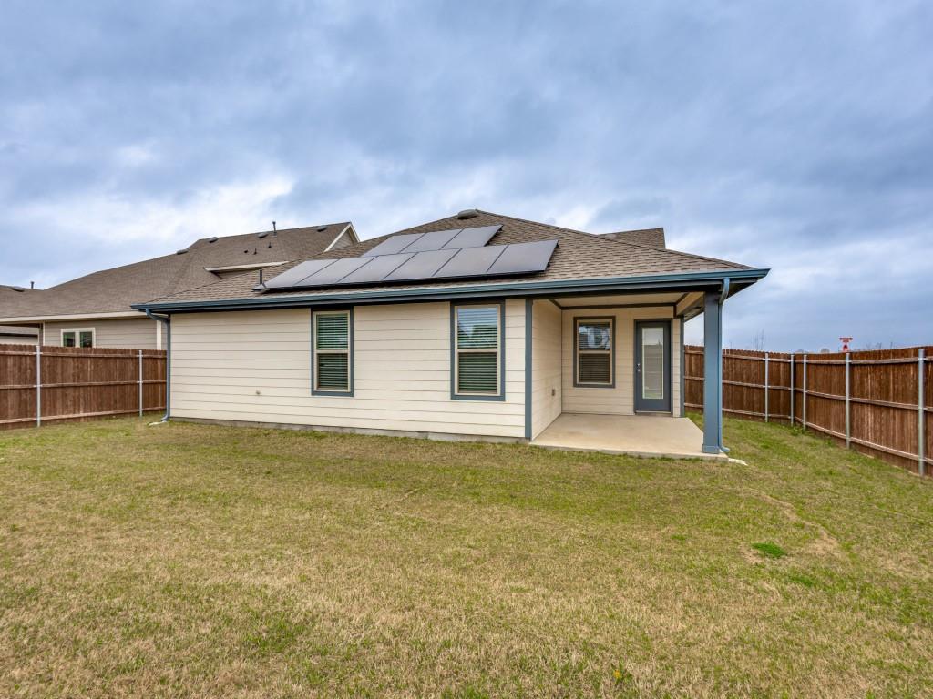 829 Primrose Lane Pilot Point, TX 76258 - Photo 36 of 37 a front view of a house with a garden