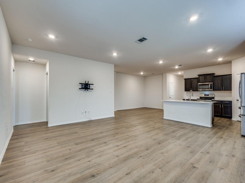 829 Primrose Lane Pilot Point, TX 76258 - Photo 9 of 37 a view of kitchen with wooden floor