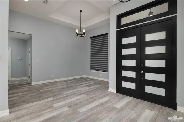 a view of a bedroom with a balcony