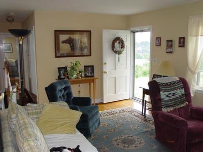 1437 Gun Club Road Northwest Roanoke, VA 24017 - Photo 15 of 16 a bedroom with a bed and wooden floor