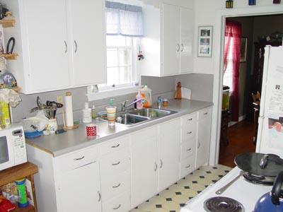 1437 Gun Club Road Northwest Roanoke, VA 24017 - Photo 3 of 16 a kitchen with sink a stove and cabinets