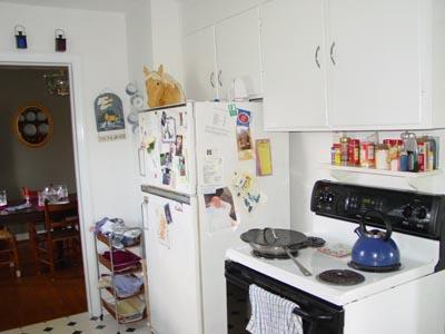 1437 Gun Club Road Northwest Roanoke, VA 24017 - Photo 4 of 16 a kitchen with a refrigerator and a stove