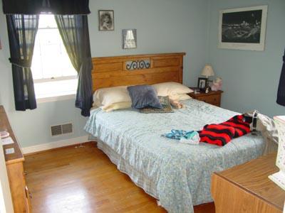 1437 Gun Club Road Northwest Roanoke, VA 24017 - Photo 6 of 16 a bedroom with a bed and window