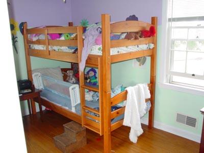 1437 Gun Club Road Northwest Roanoke, VA 24017 - Photo 7 of 16 a view of a bedroom with baby bed and a window