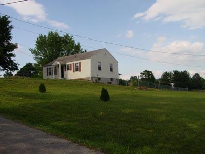 1437 Gun Club Road Northwest Roanoke, VA 24017 - Photo 9 of 16 a view of house with backyard and garden